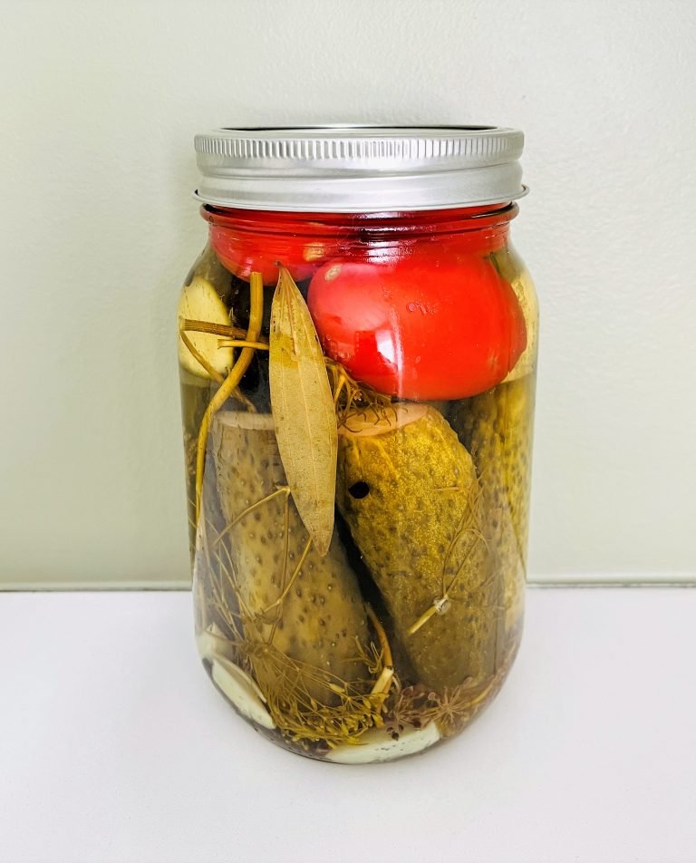 Tomatoes and dill pickles in one jar. Deliciosly crunchy!