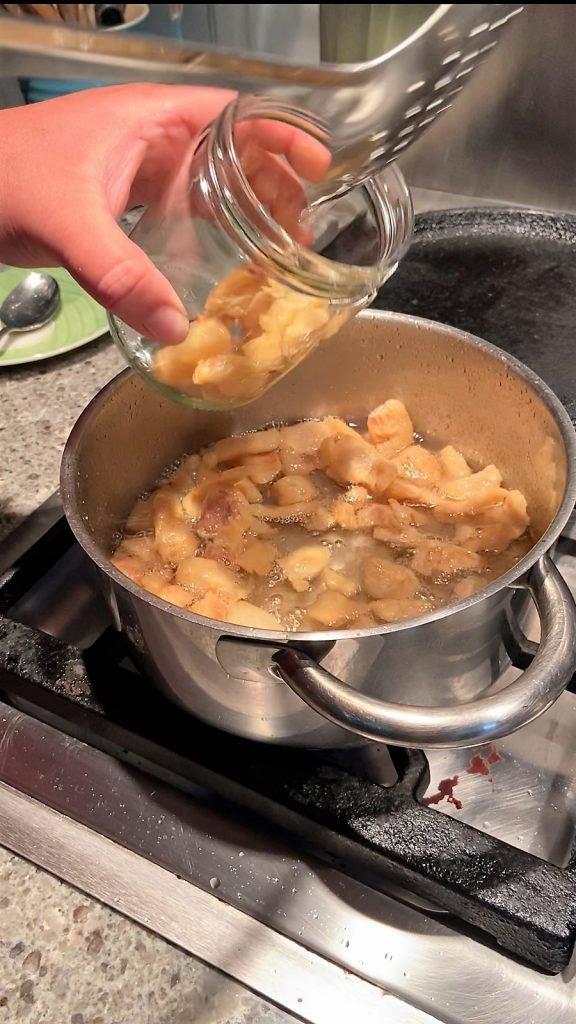 scoop cracklings into freezer-safe jar