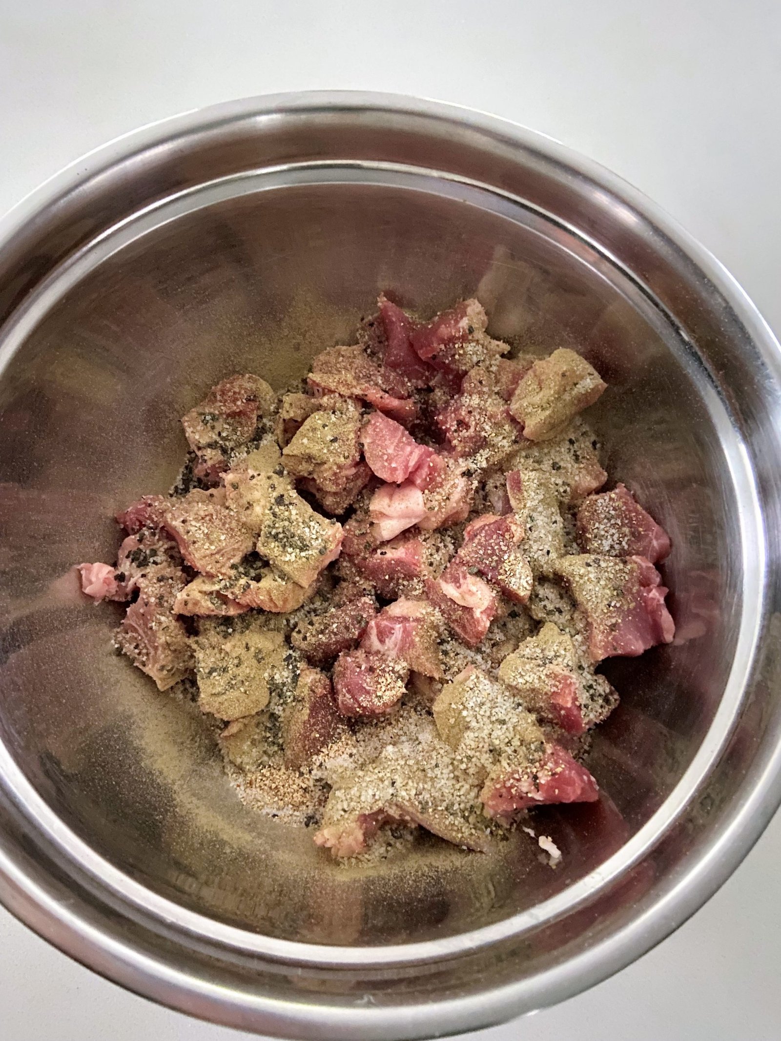 chopped pork with spices in a bowl