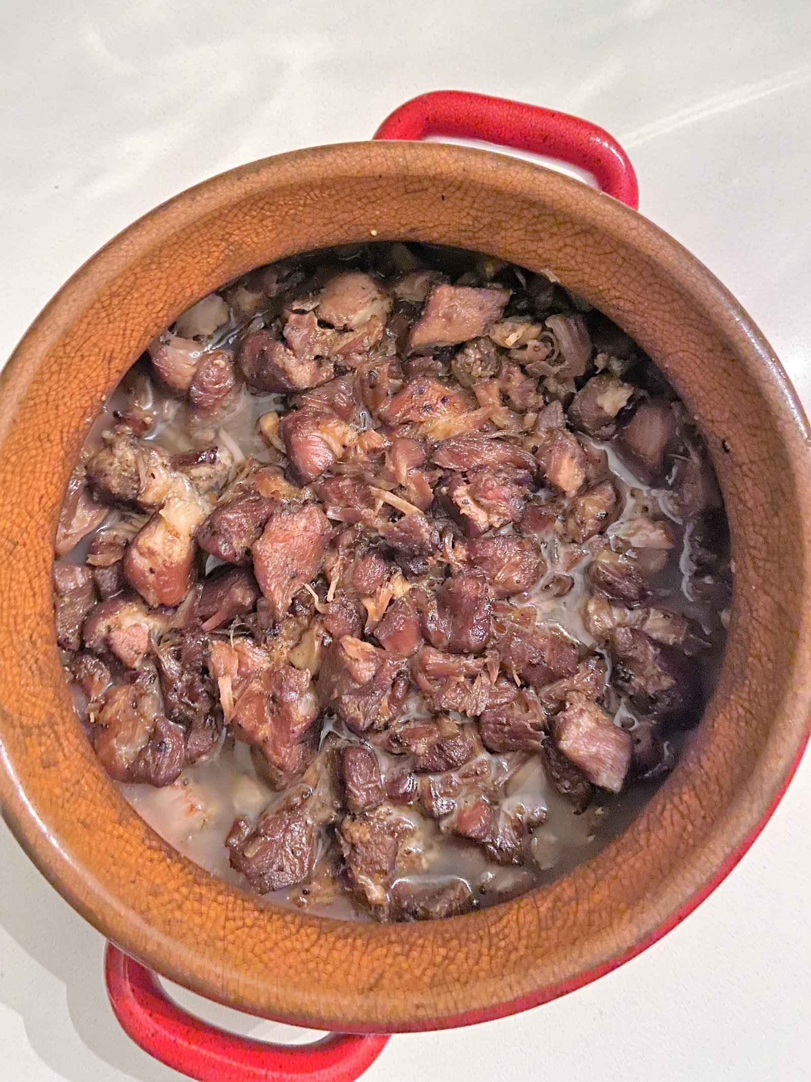 cook pork for 4 - 6 hours to make pork confit