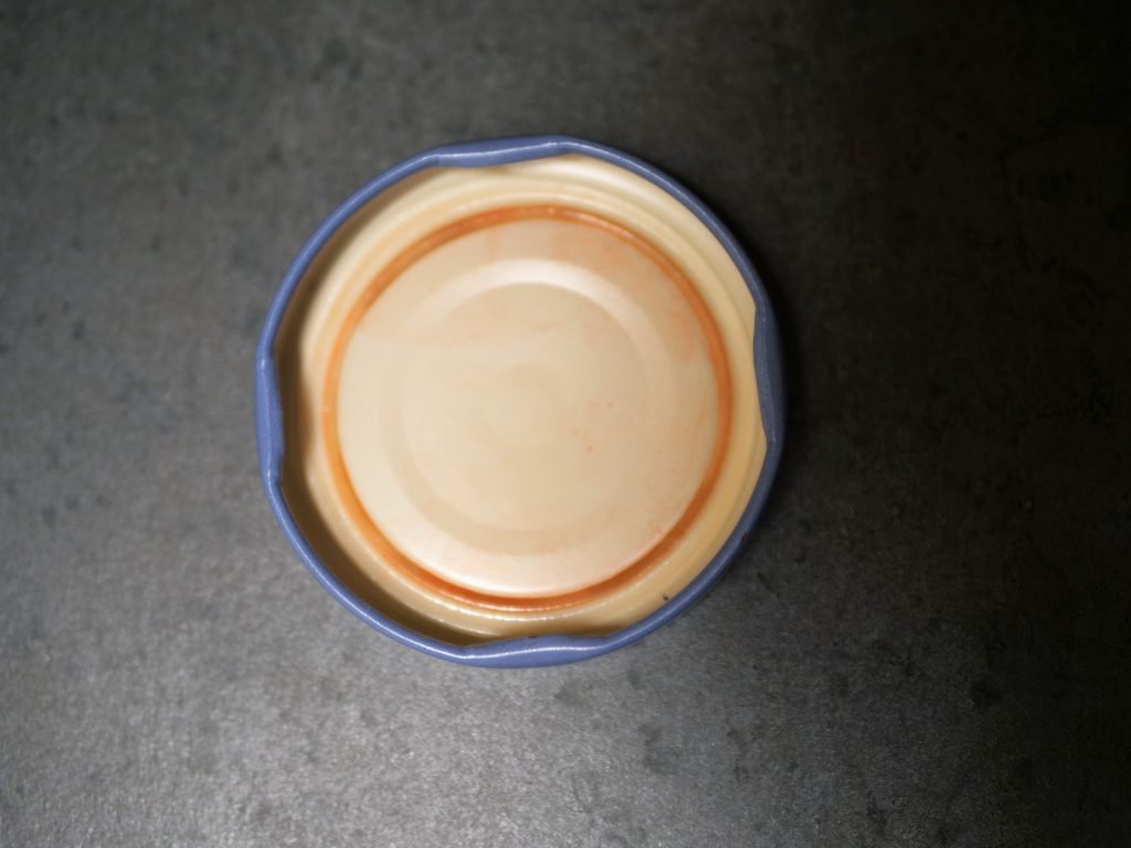 twist top metal lid that you should not reuse for canning