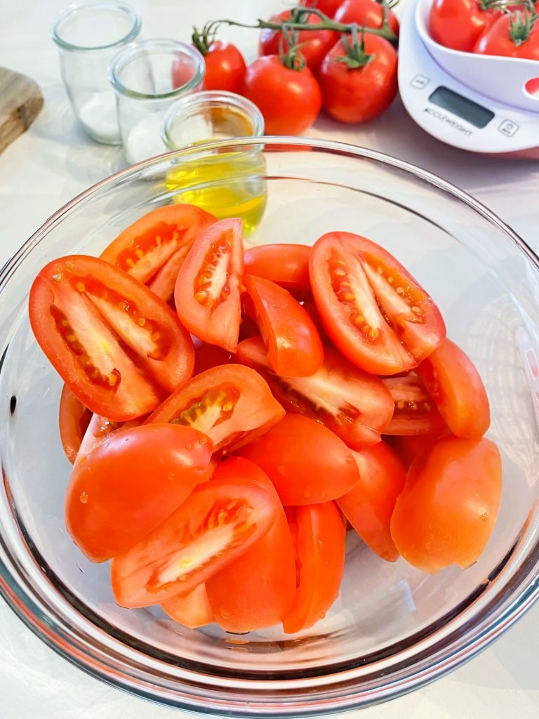 core tomatoes and quarter or cut in half