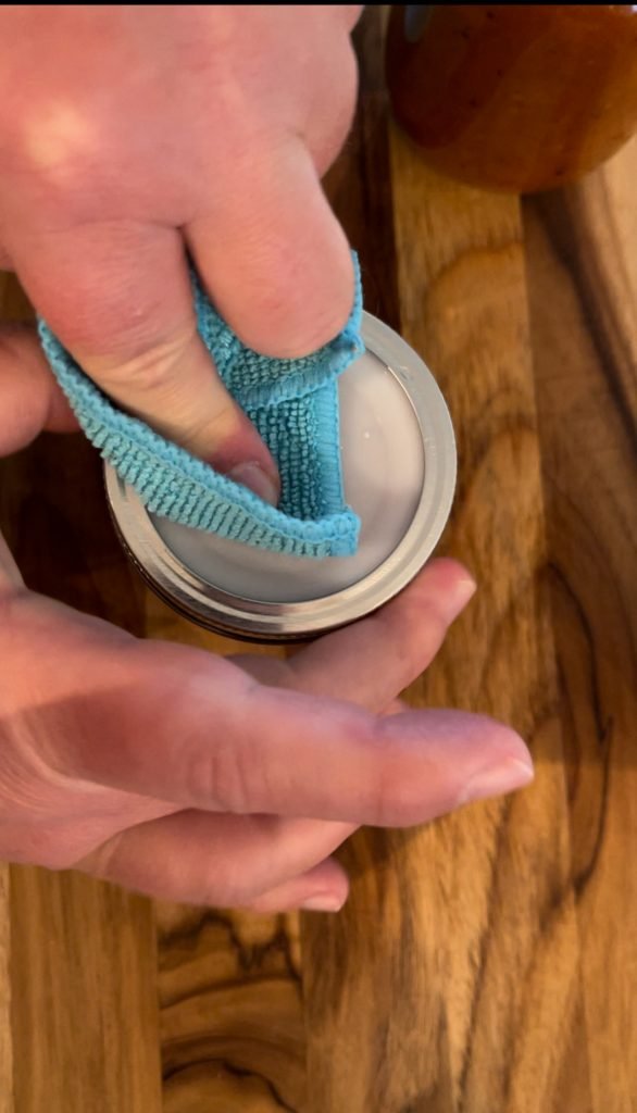 tighten till jar begins to spin under your finger