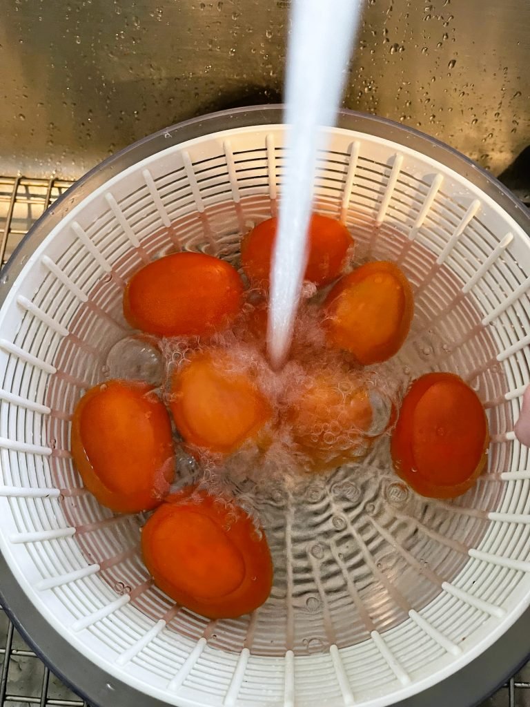 wash tomatoes